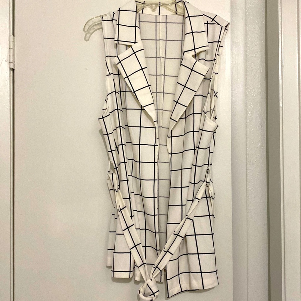 White and black vest